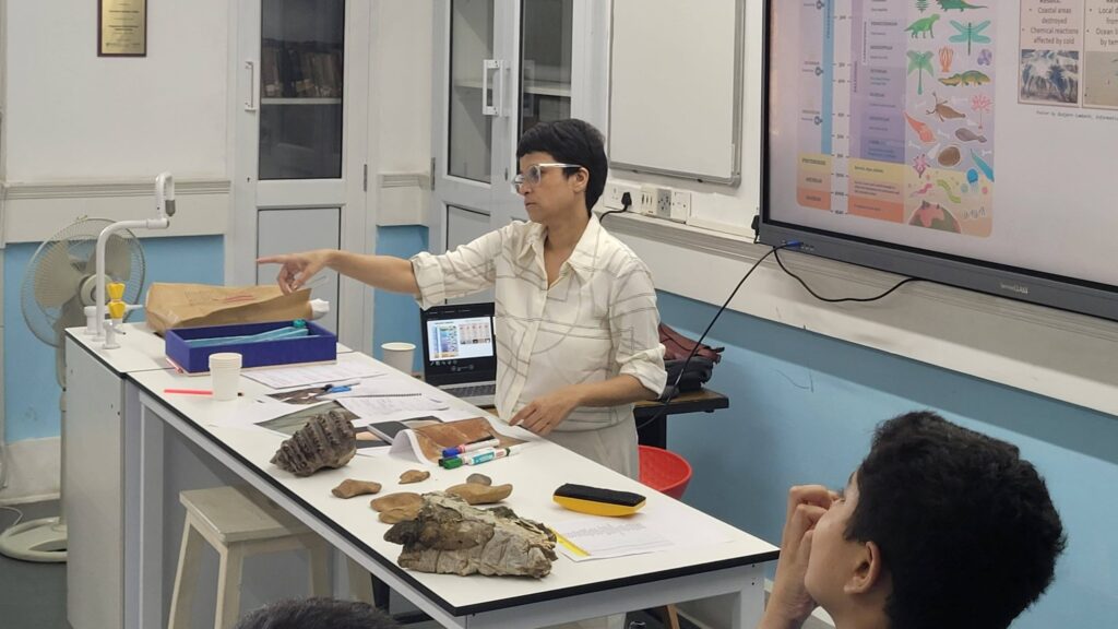 Students debating and learning potential future index fossils during the geology workshop